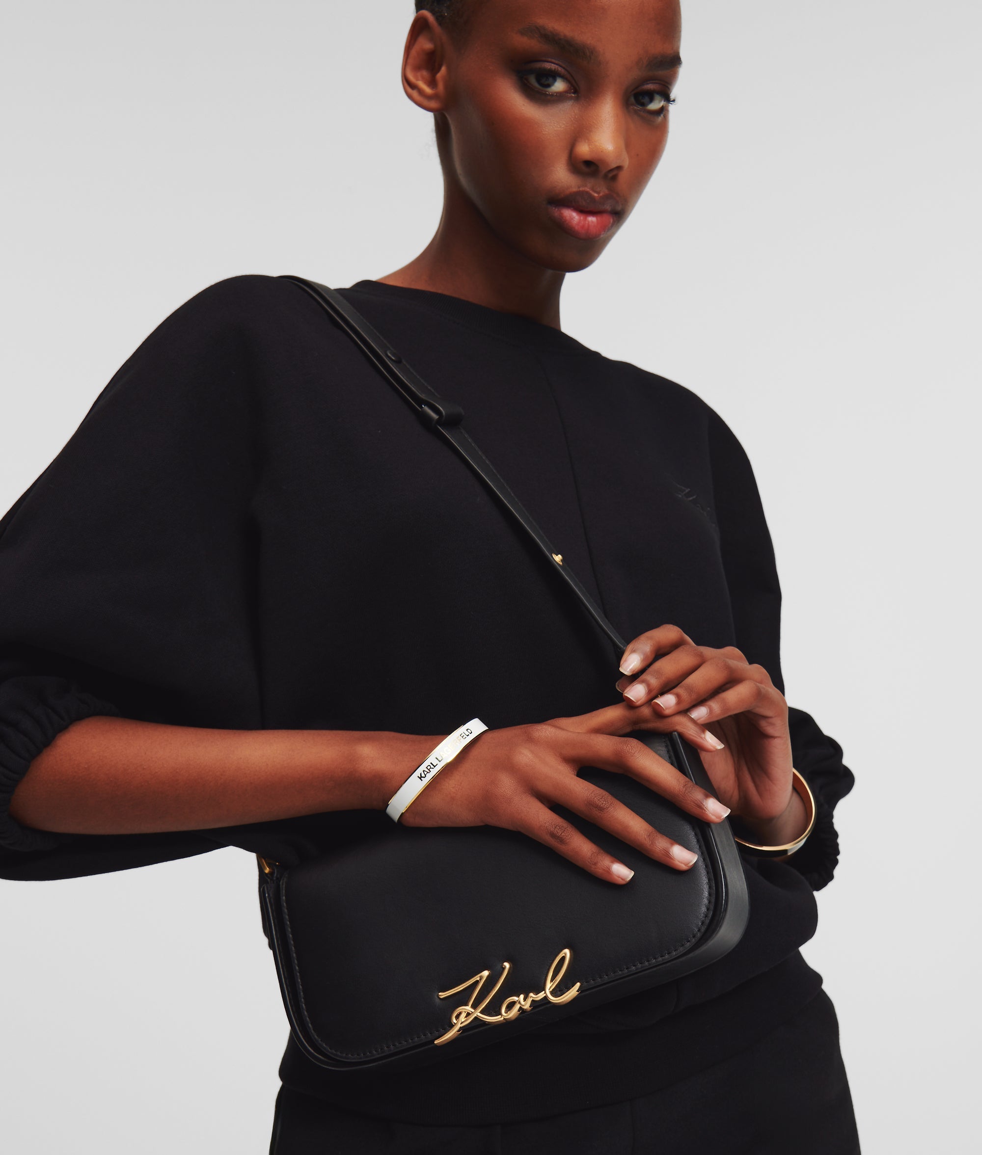 K/Signature two-way crossbody bag