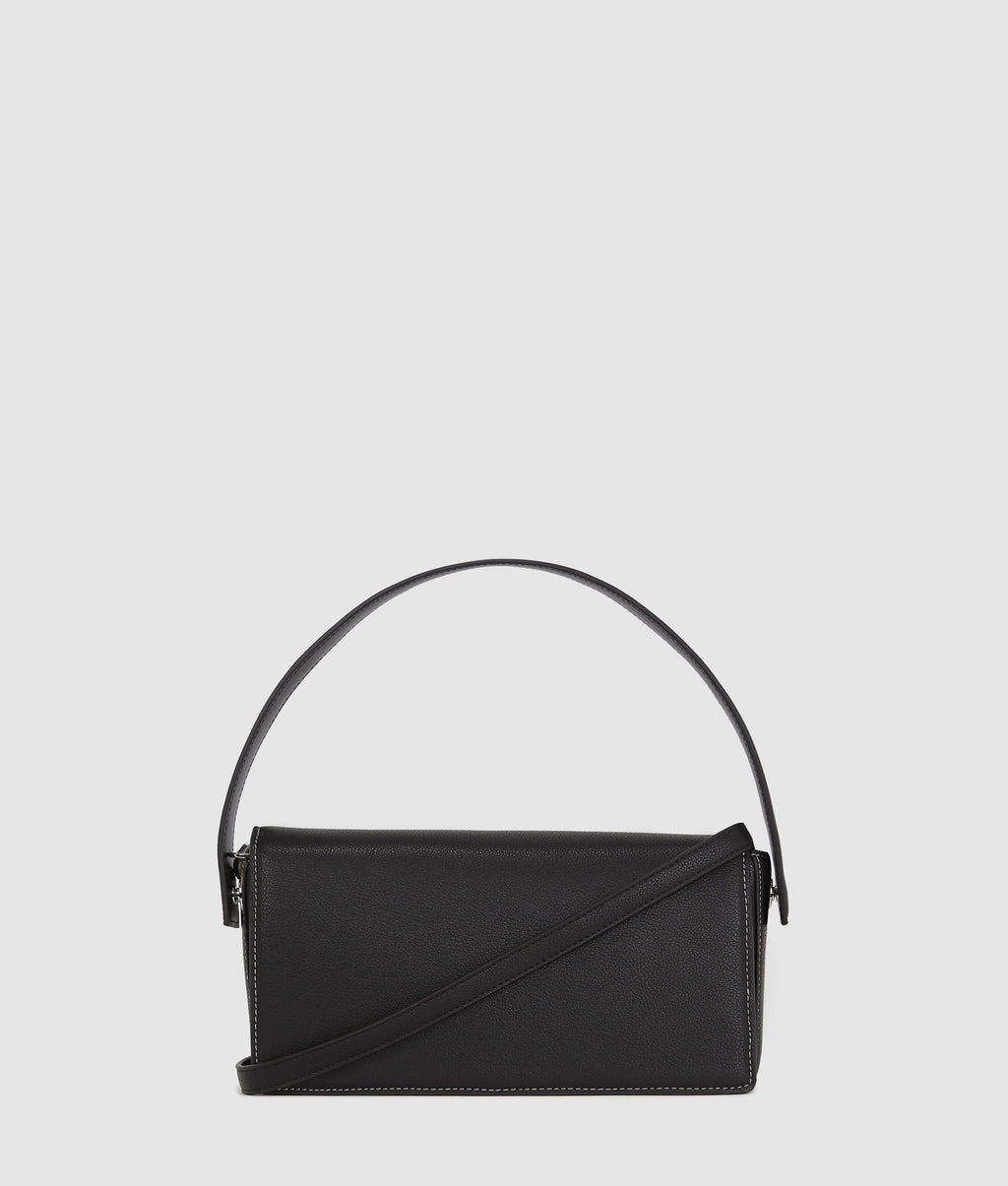 Metal logo top handle bag