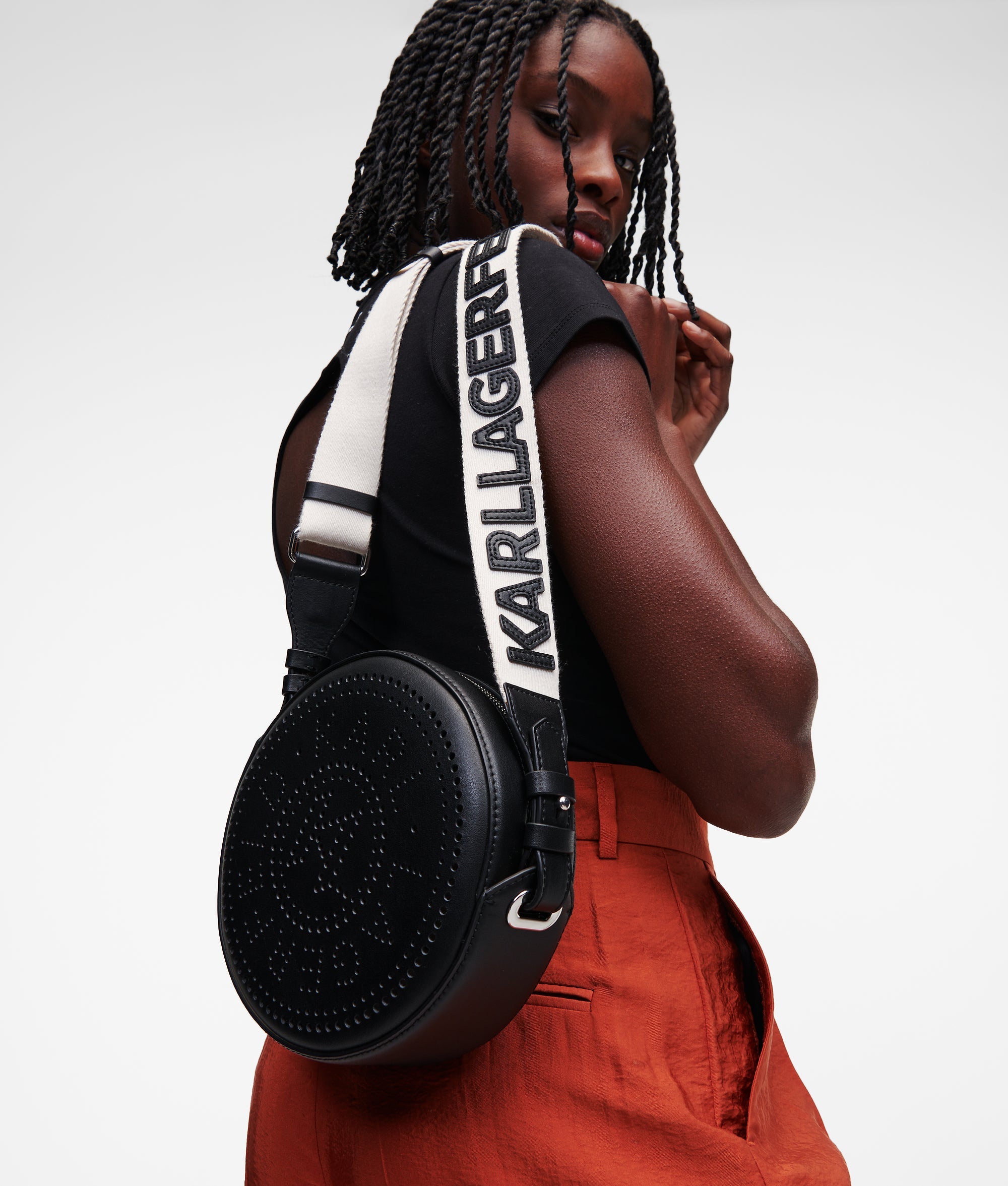 K/CIRCLE embossed logo round crossbody bag