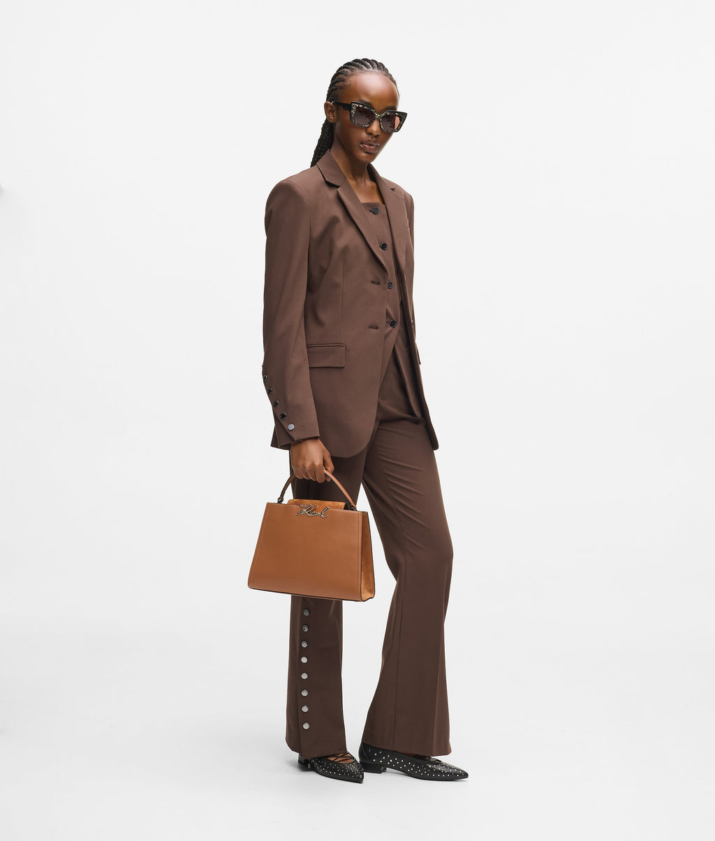 K/Signature suede top handle bag