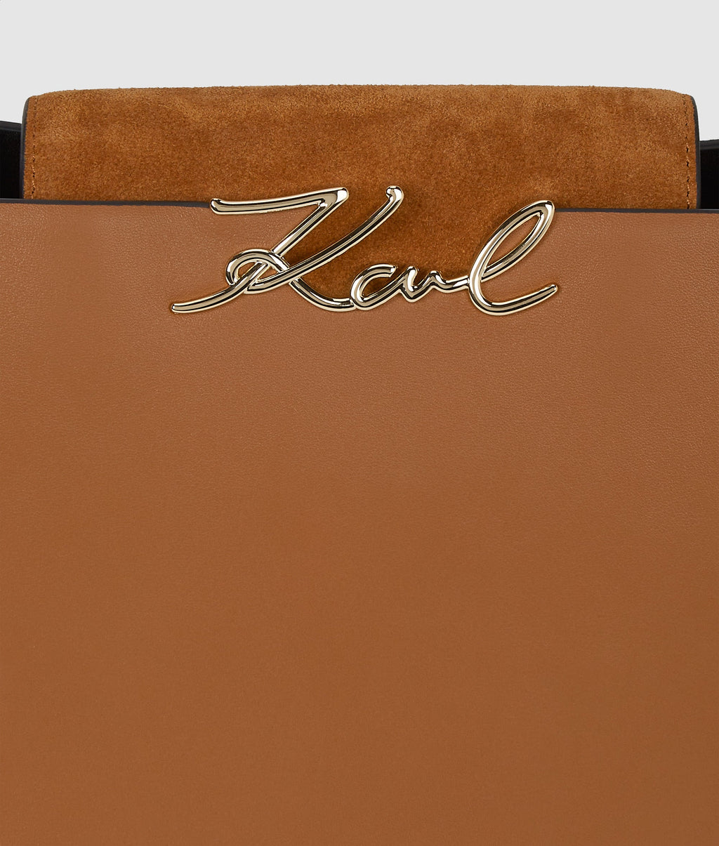 K/Signature suede top handle bag