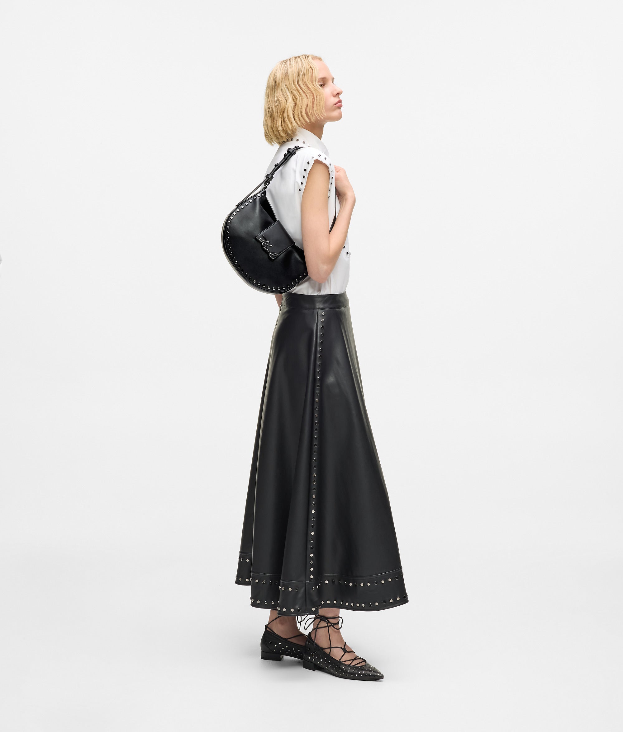 K/Signature studded moon bag