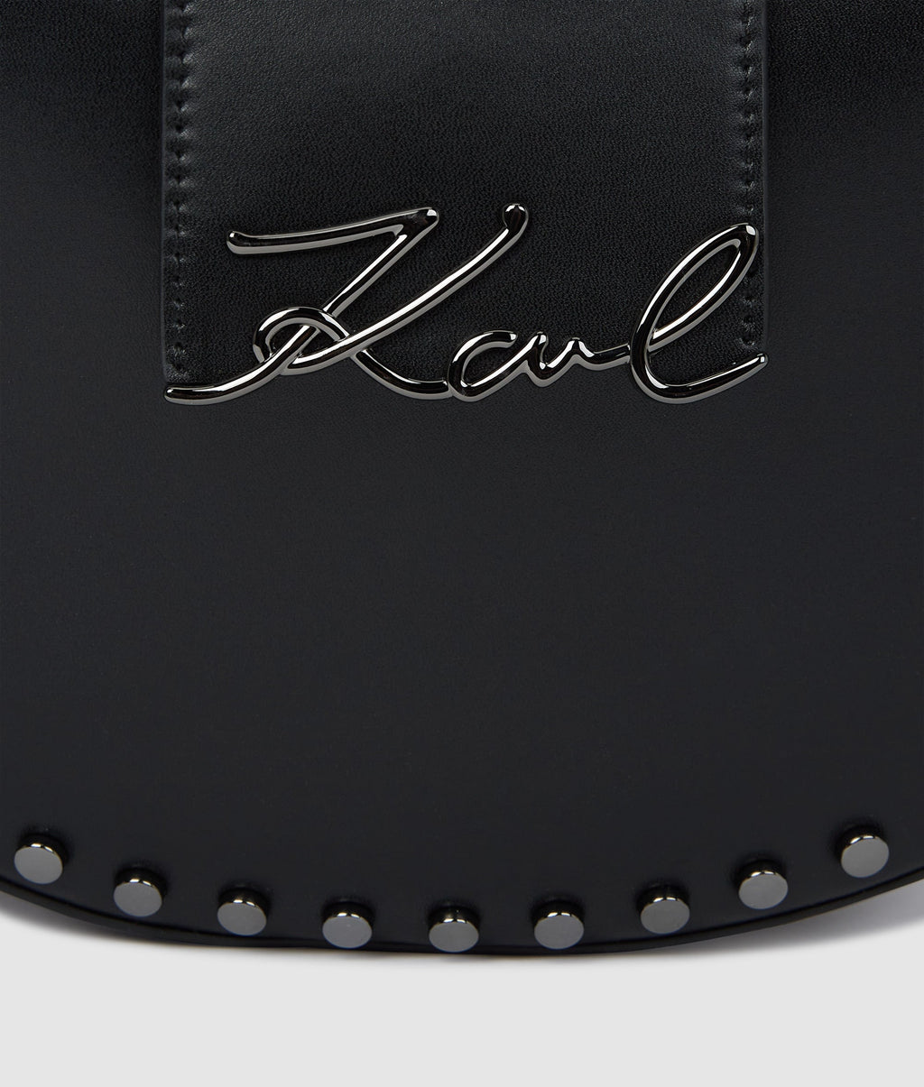 K/Signature studded moon bag