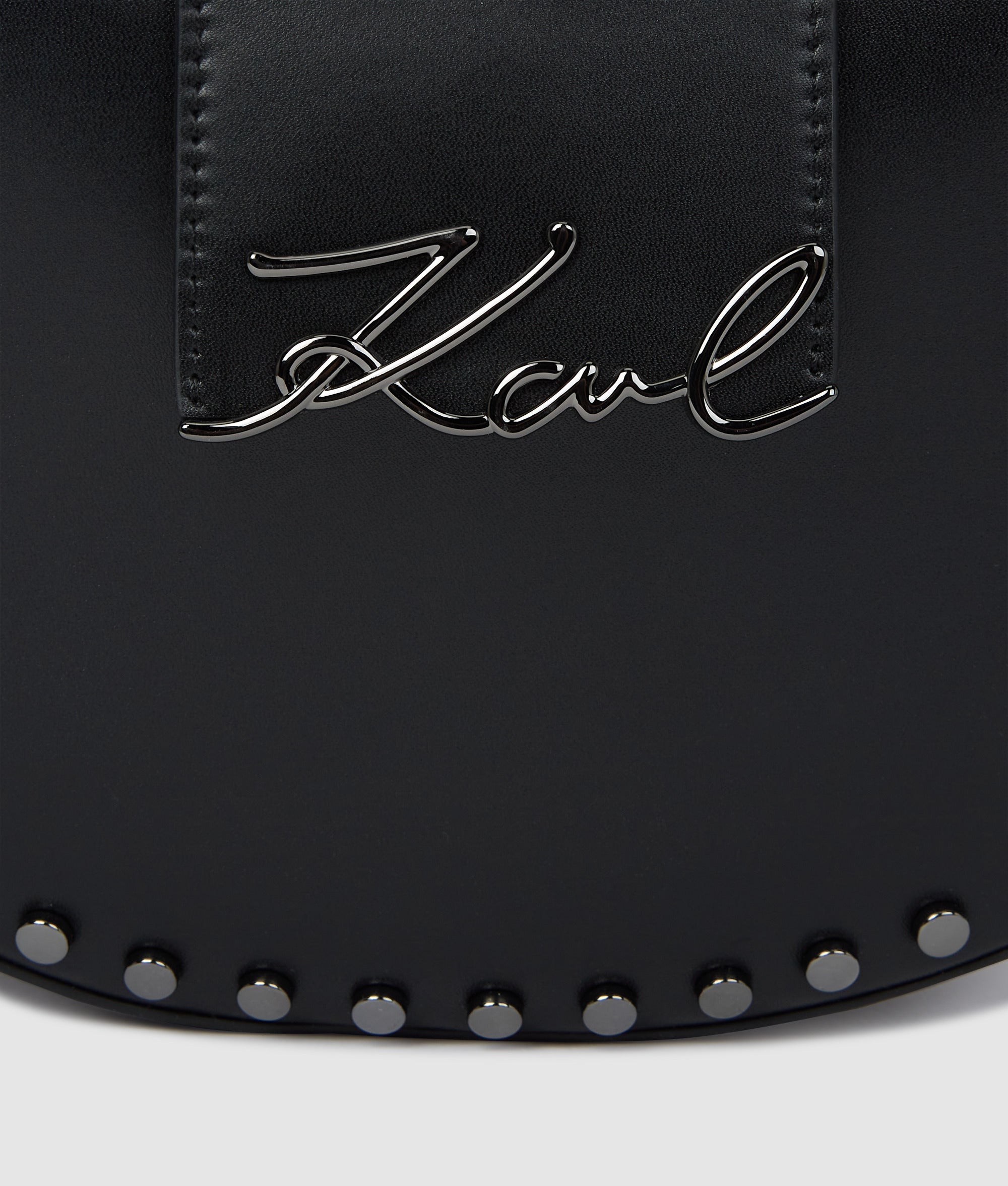 K/Signature studded moon bag