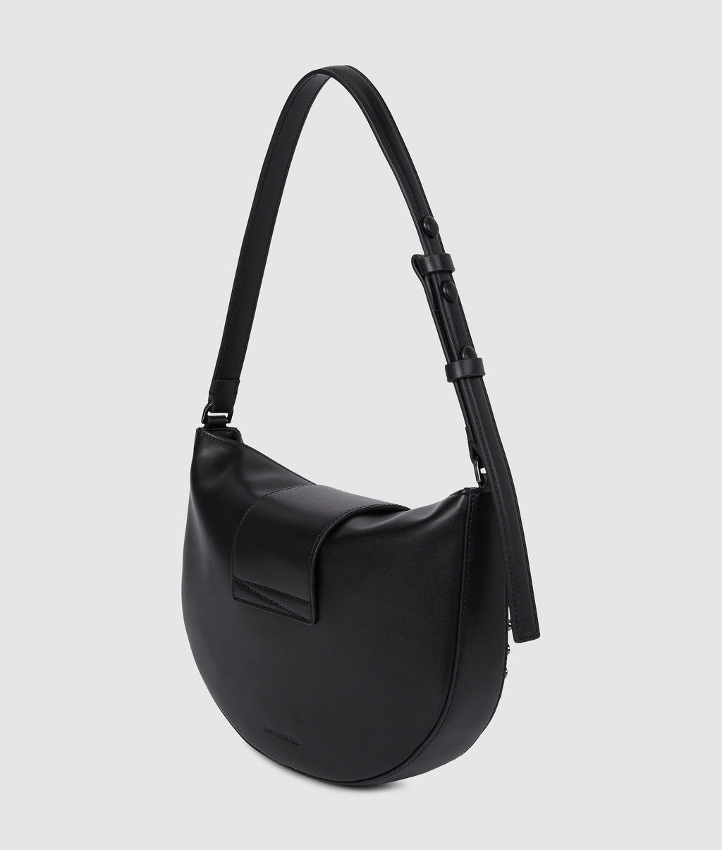 K/Signature studded moon bag