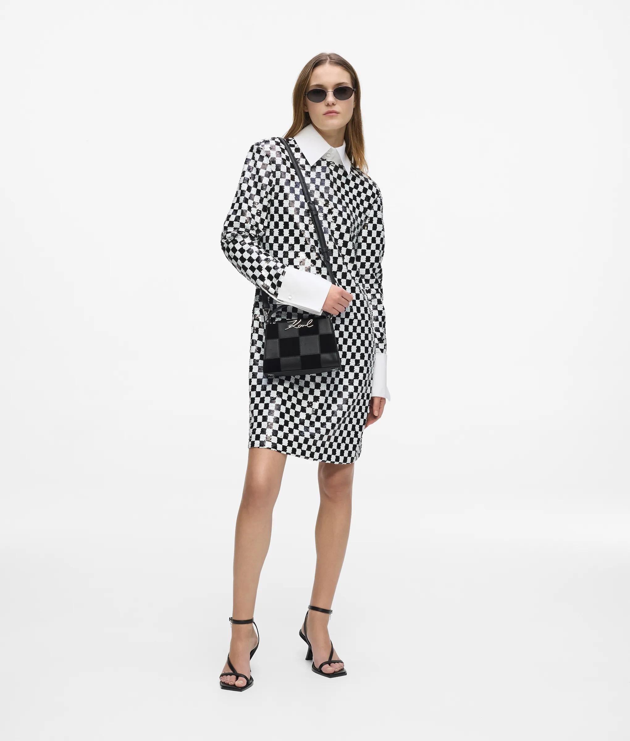 K/Signature checkered top handle bag
