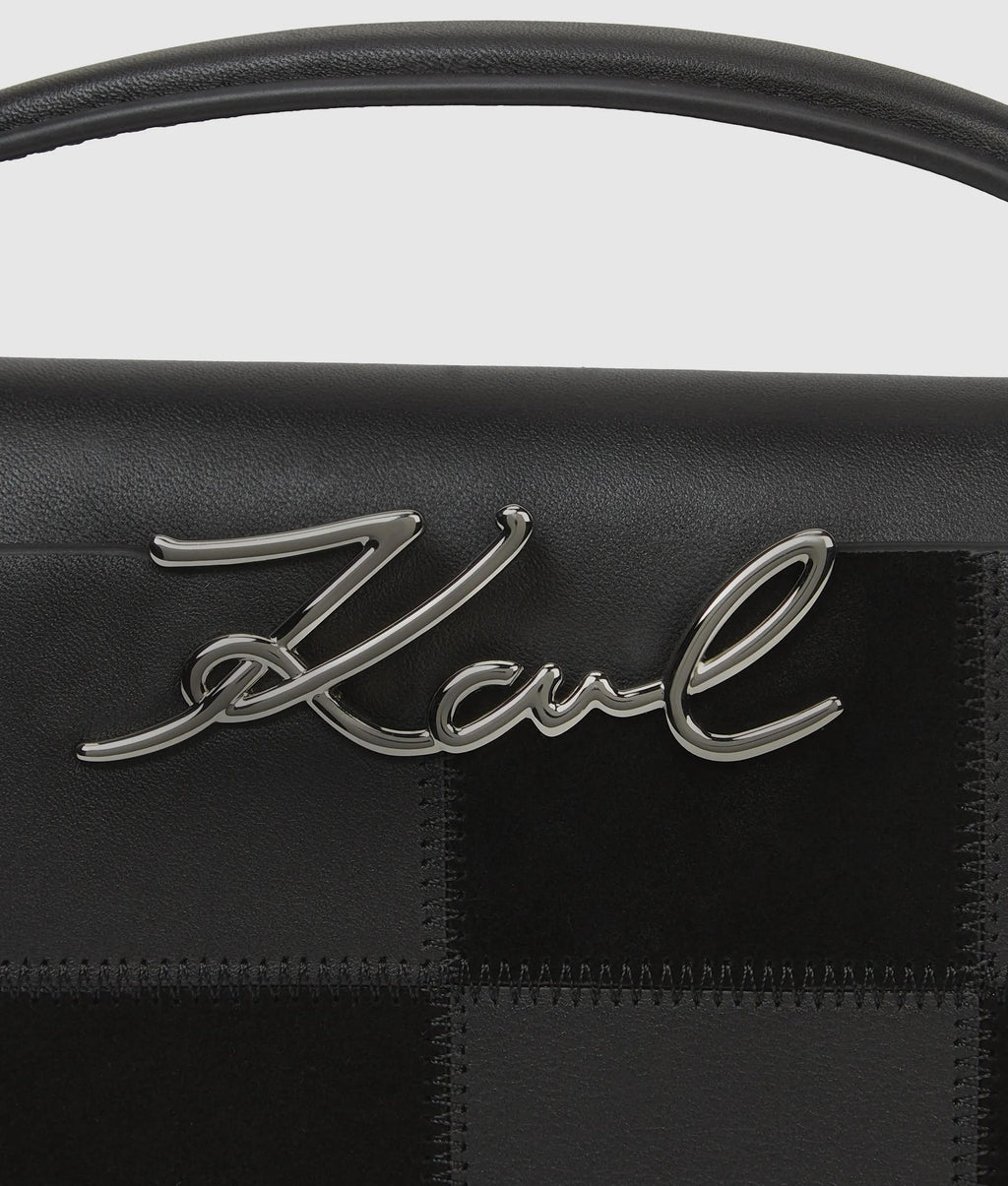 K/Signature checkered top handle bag