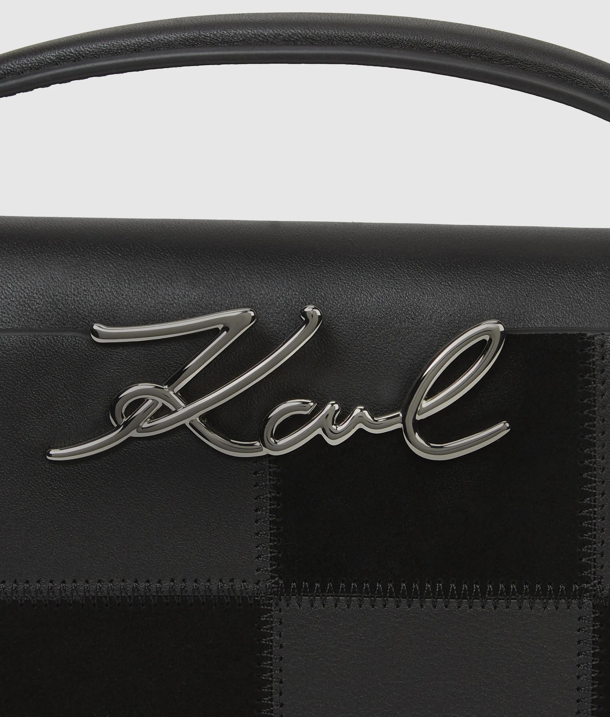 K/Signature checkered top handle bag