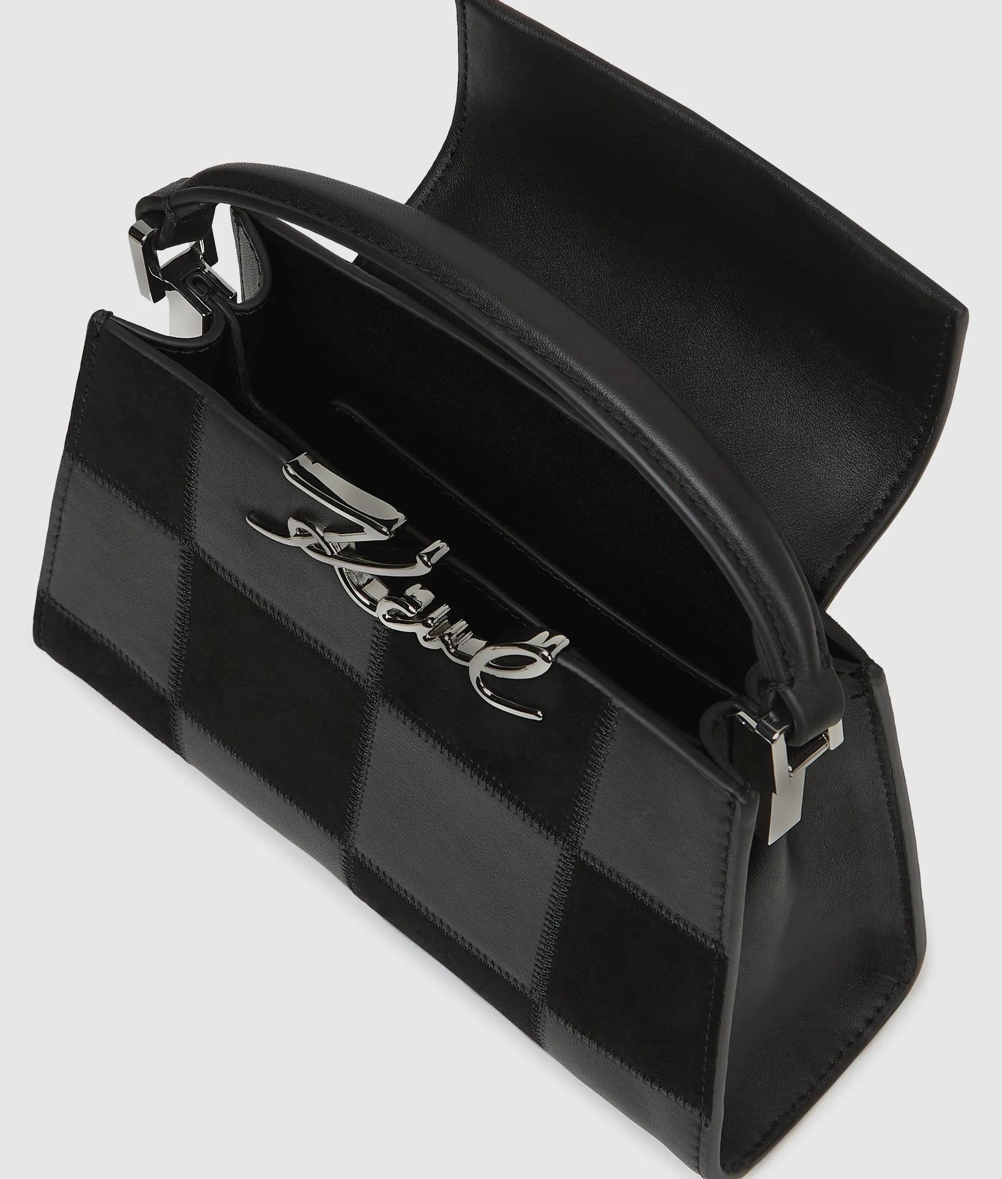 K/Signature checkered top handle bag
