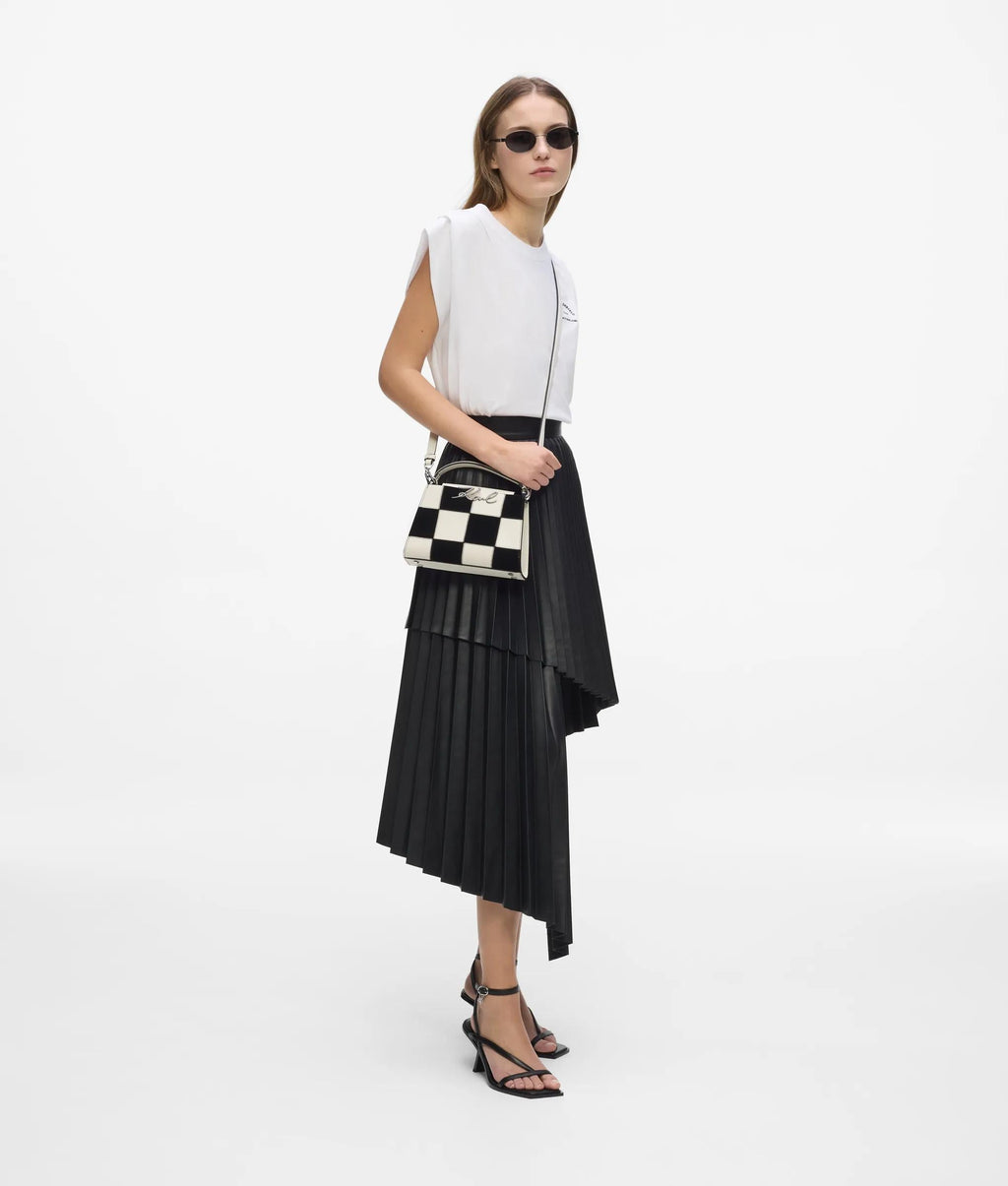 K/Signature checkered top handle bag