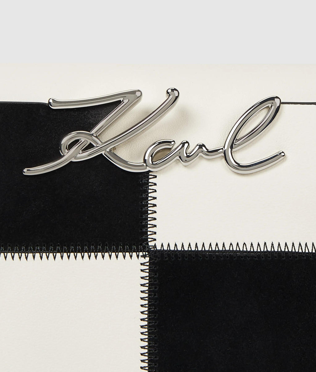 K/Signature checkered top handle bag