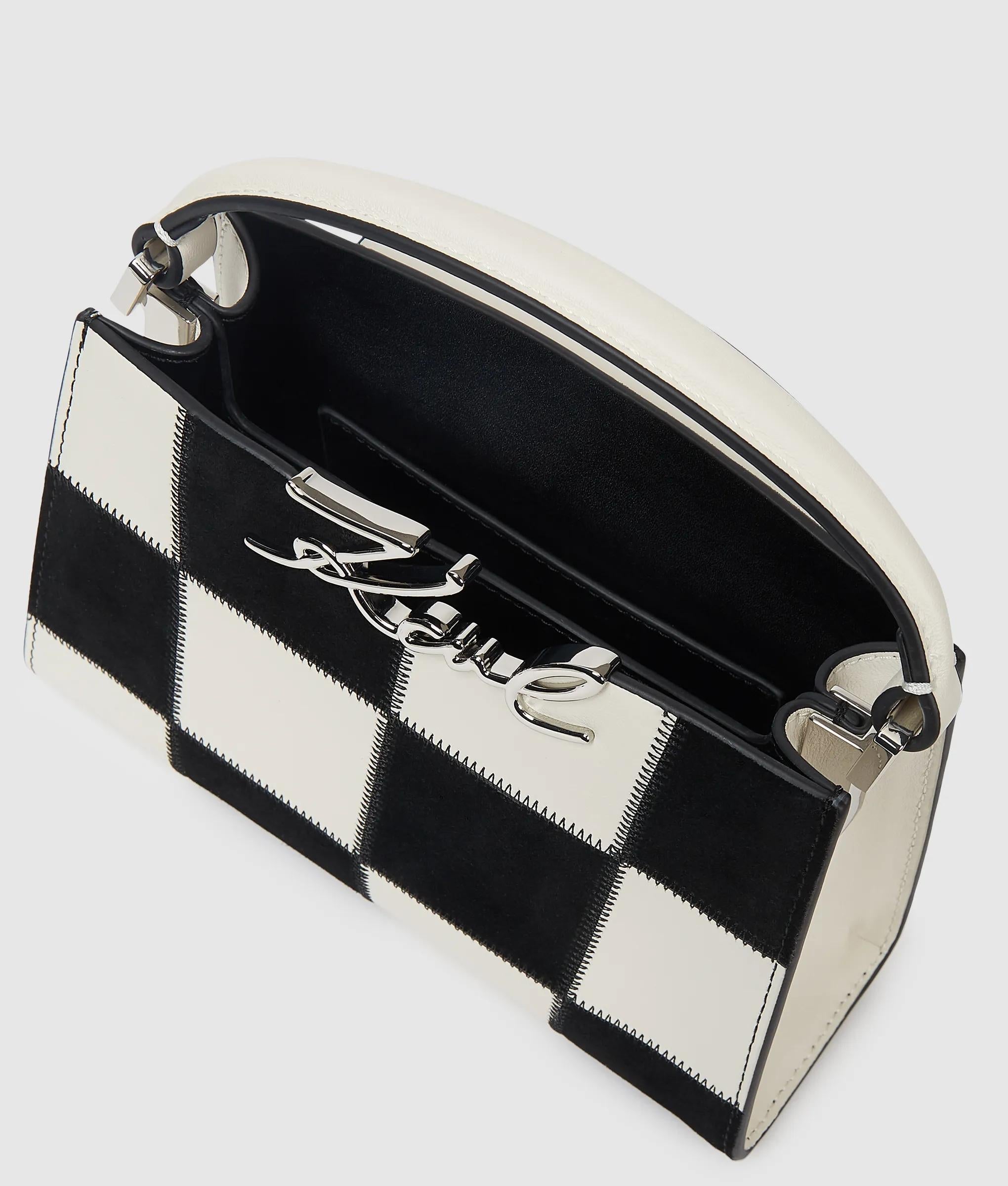K/Signature checkered top handle bag