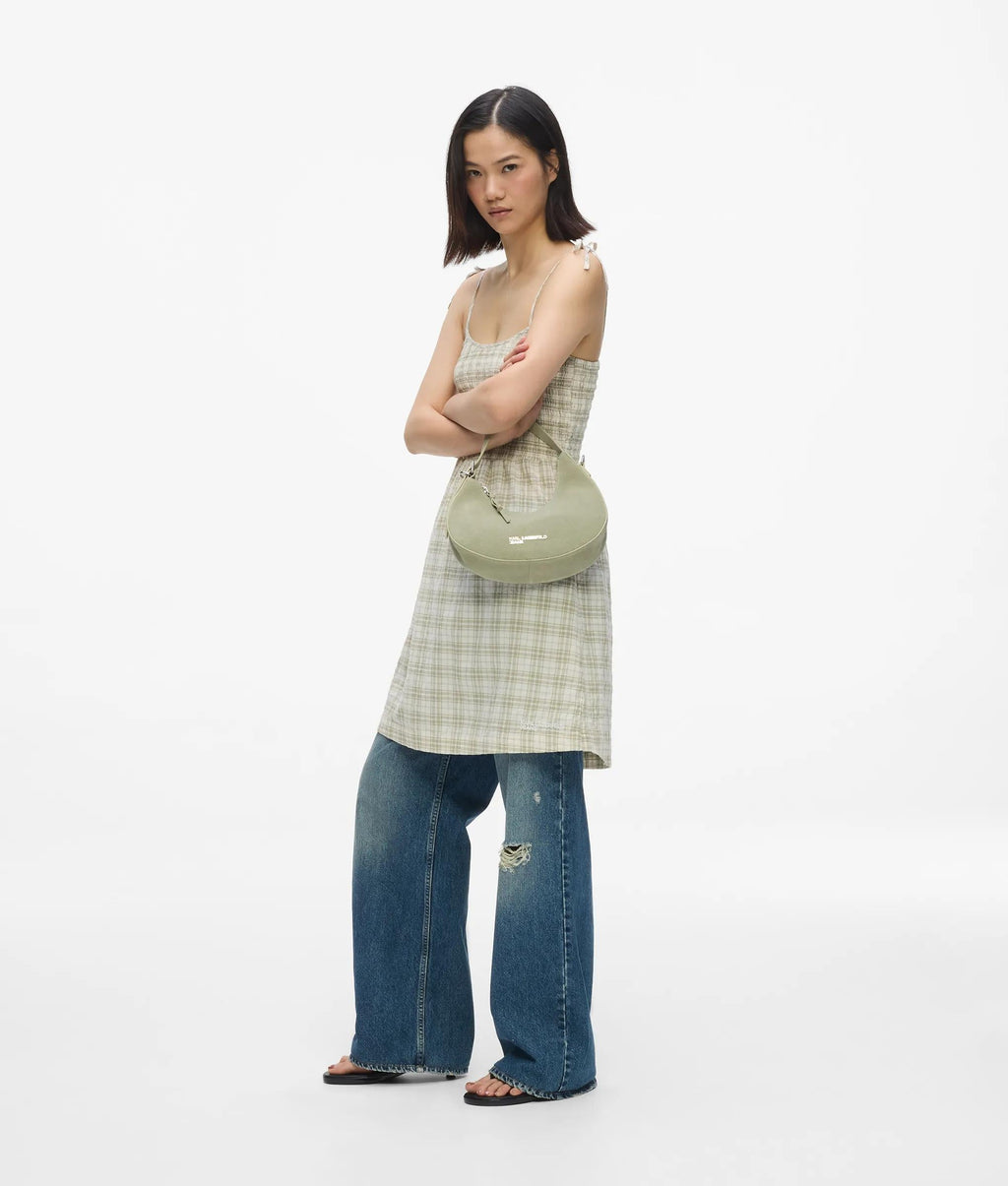 Rounded suede top handle bag