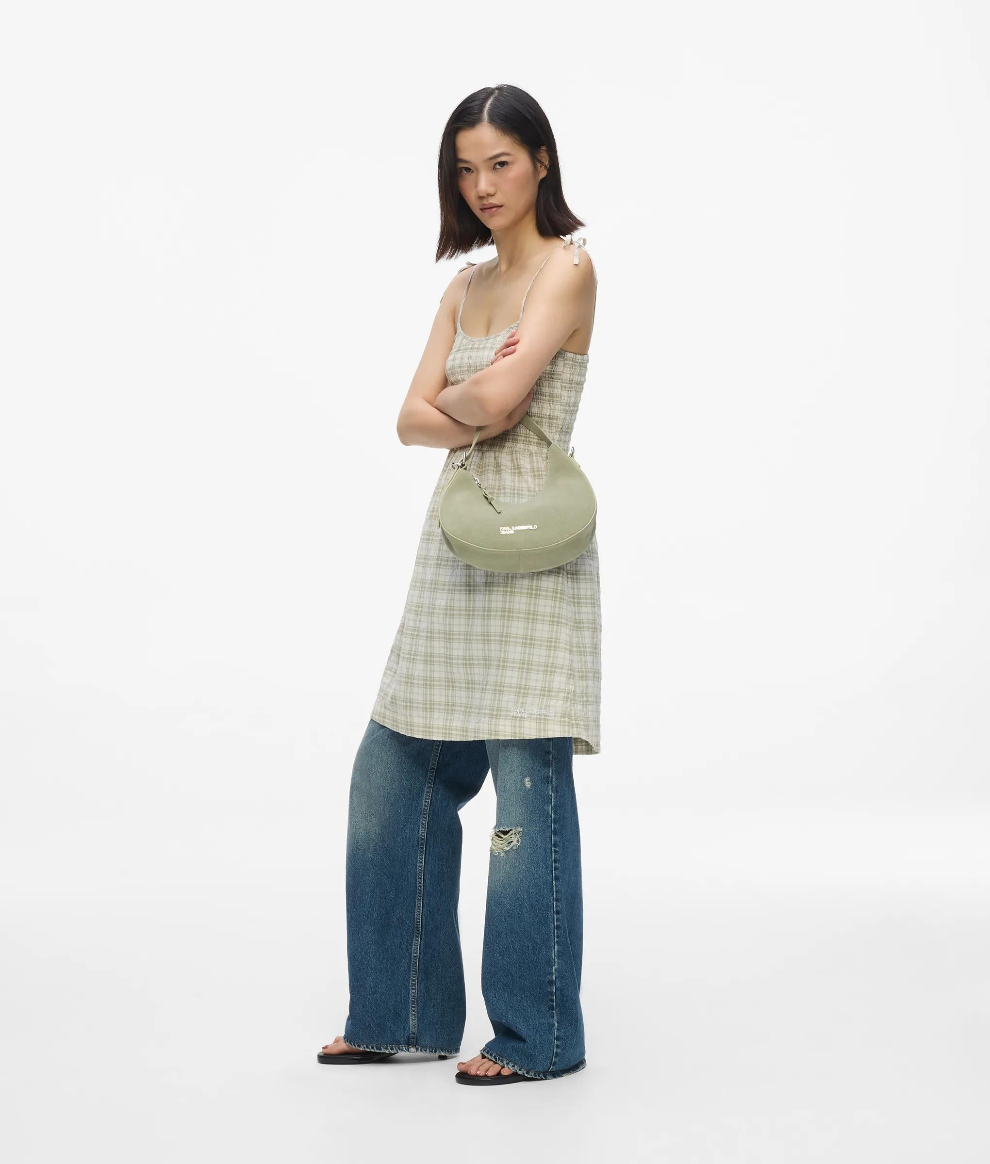 Rounded suede top handle bag