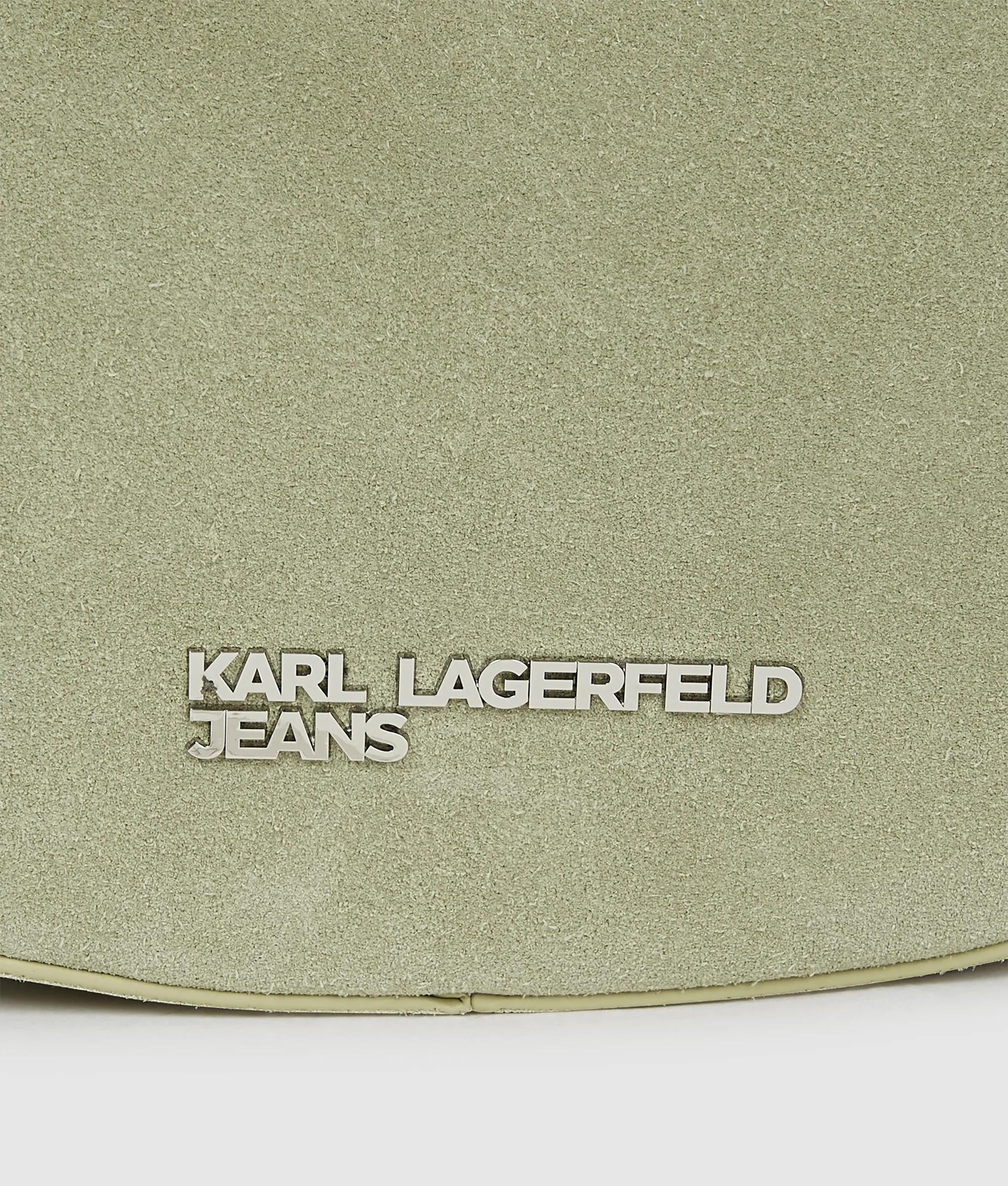 Rounded suede top handle bag