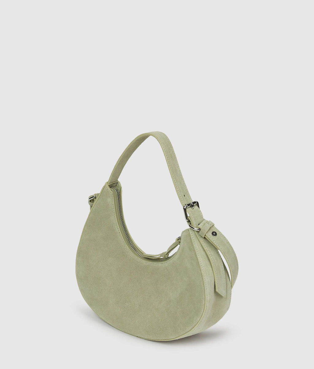 Rounded suede top handle bag