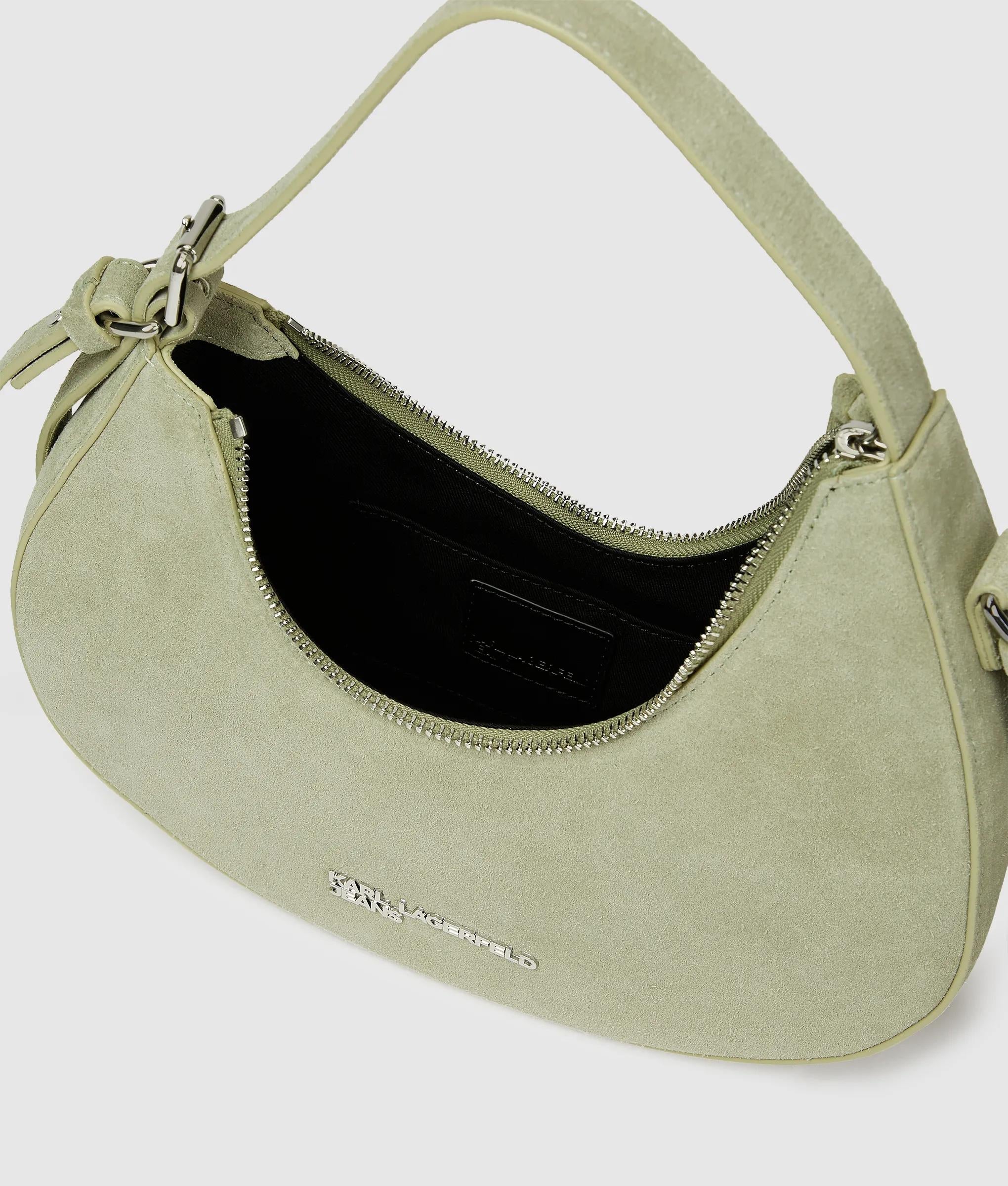 Rounded suede top handle bag