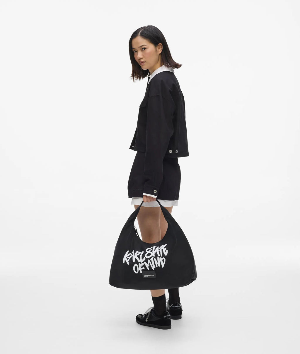 Slouchy Karl quote tote bag