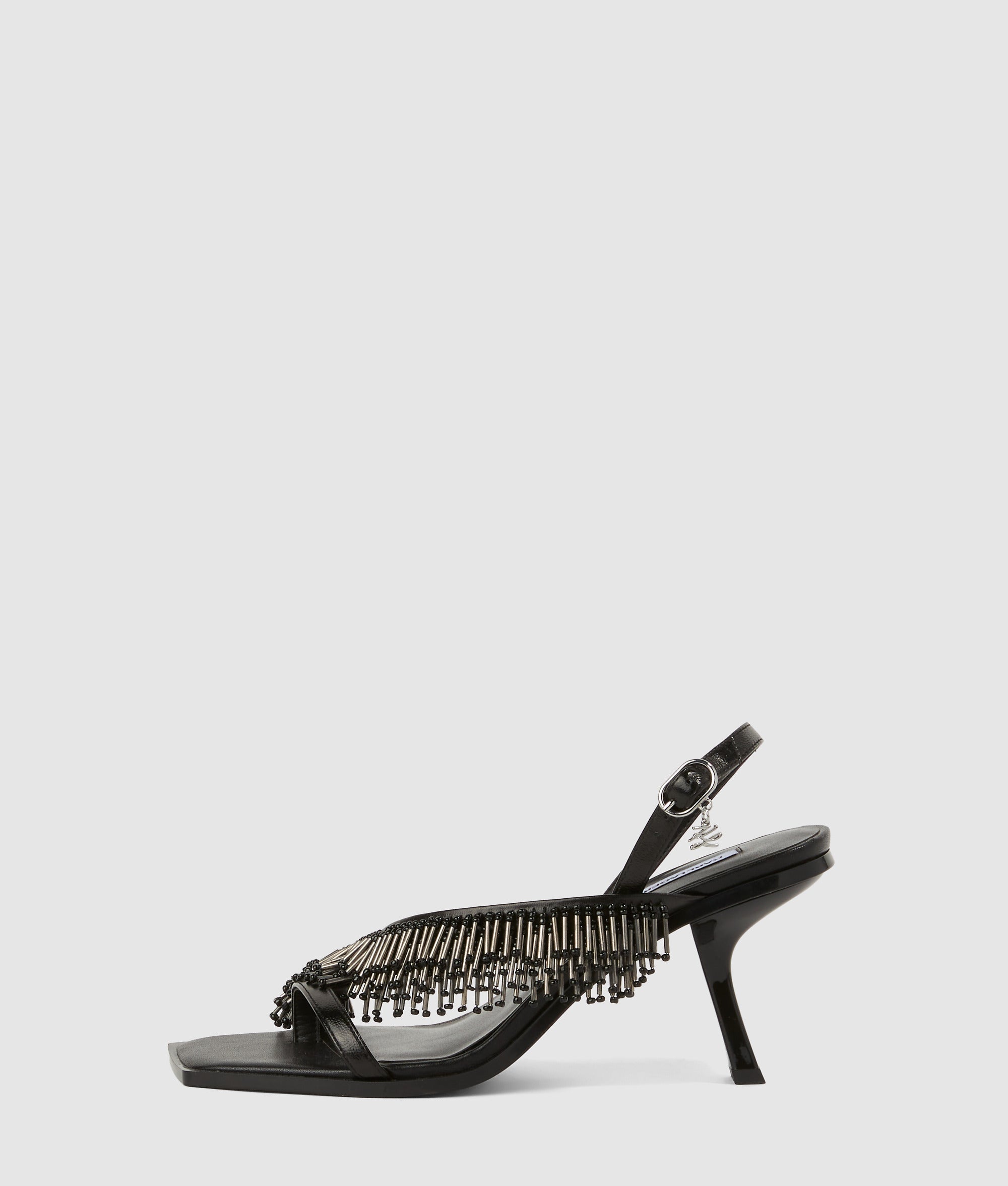Karmel fringe heeled slingbacks